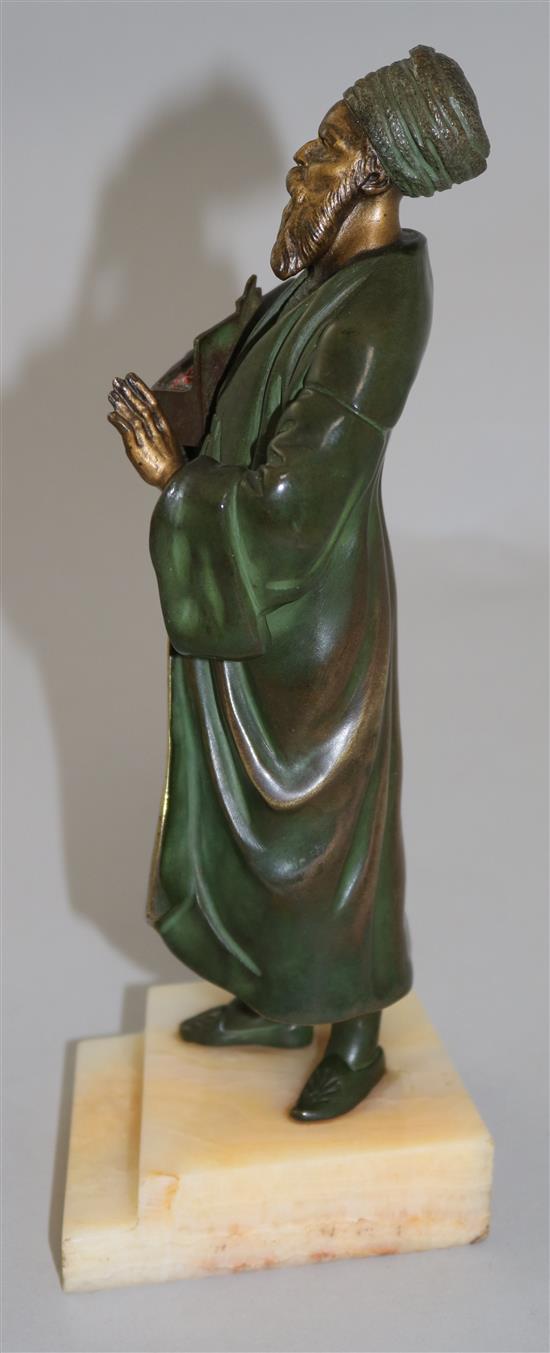 An early 20th century cold painted bronze figure of a Turkish merchant, 9in,